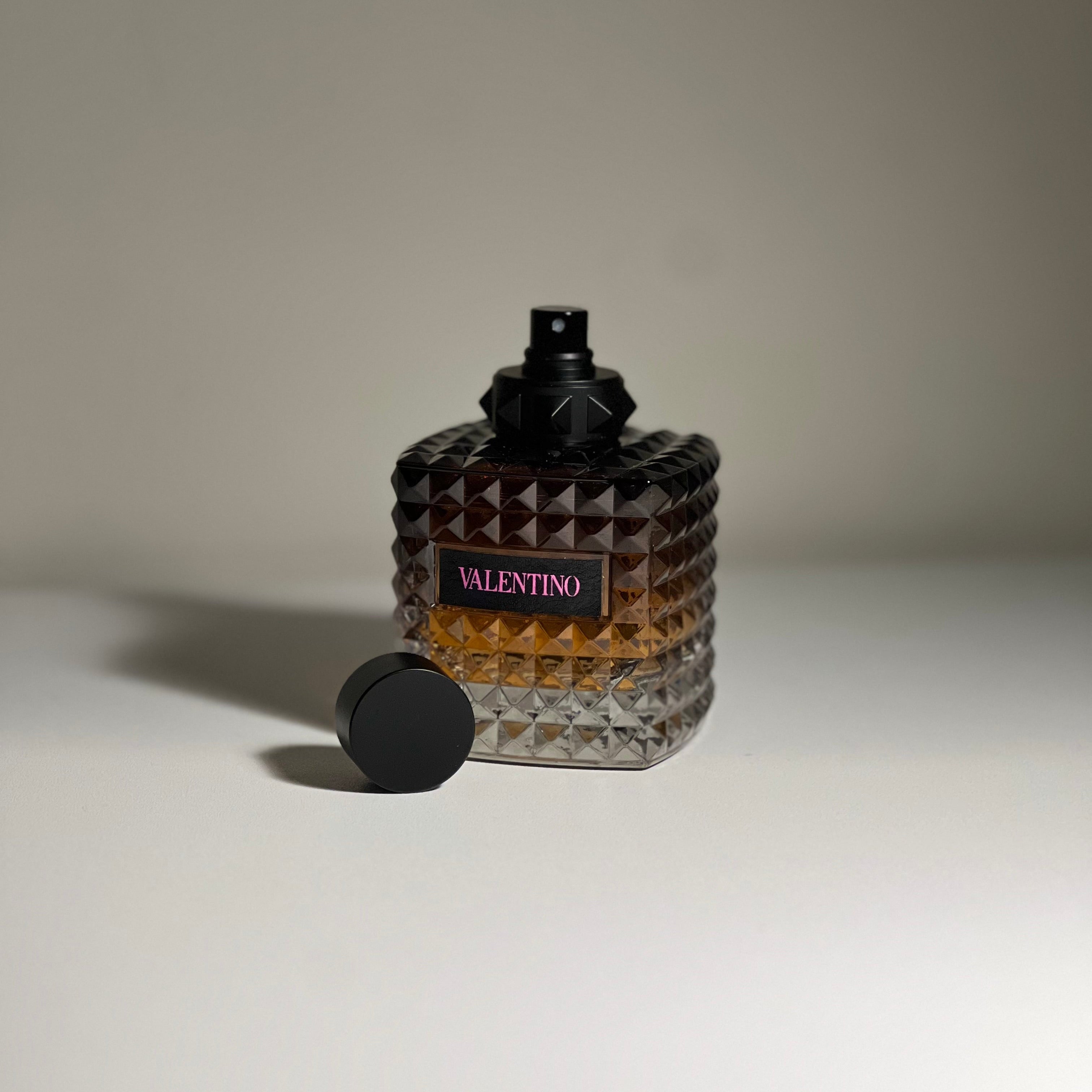 Valentino perfume bottle on a neutral background