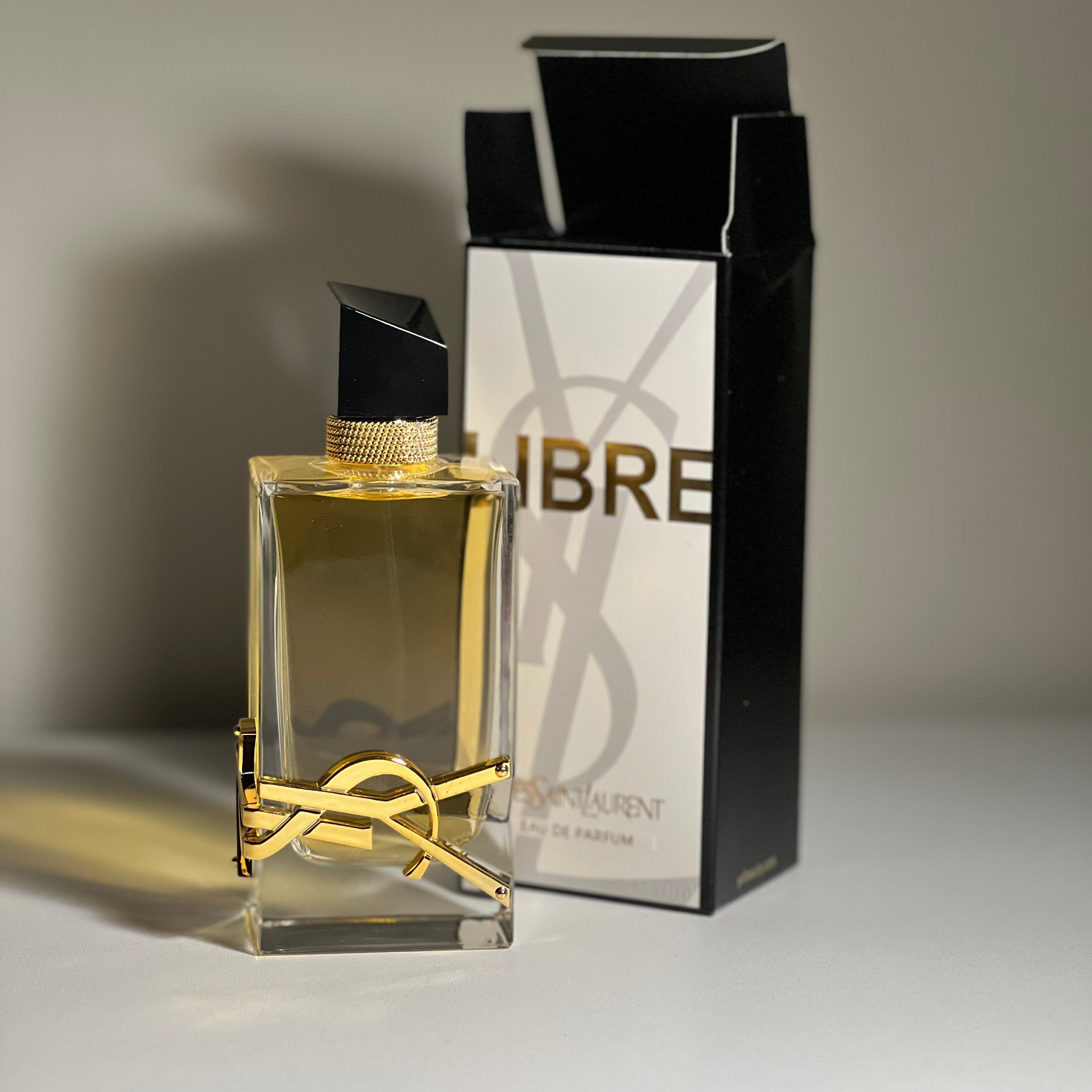 YSL Libre perfume bottle and packaging on a neutral background