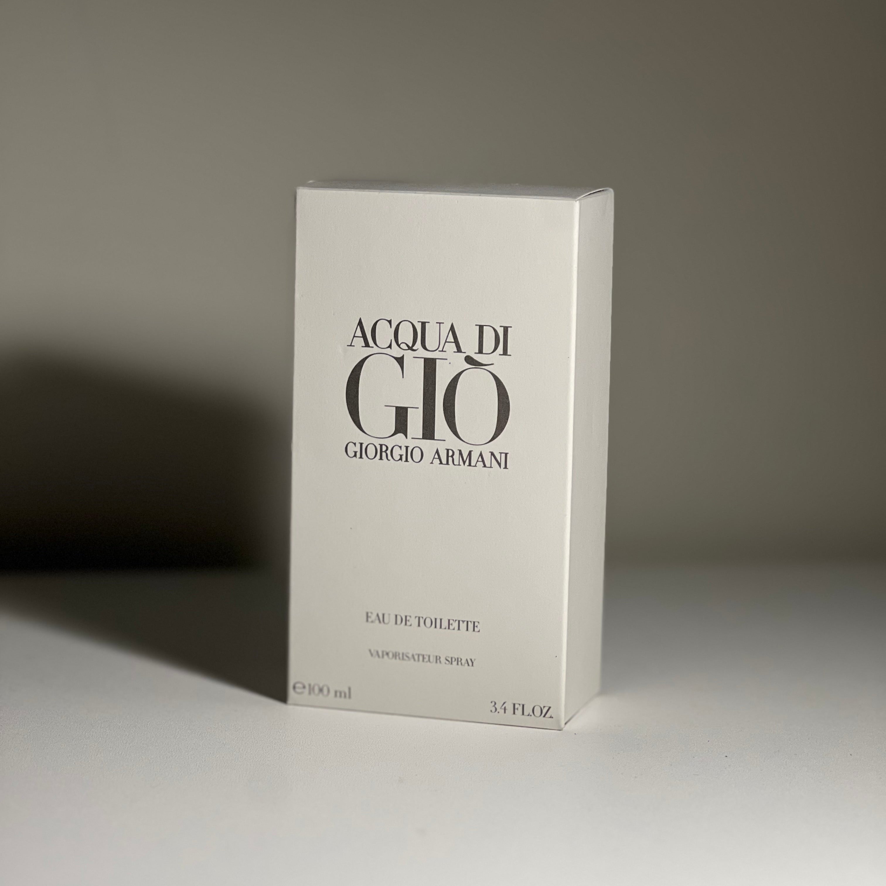 Giorgio Armani Acqua di Giò perfume box on a neutral background